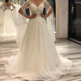 A-Line Deep V-Neck Short Sleeve Backless Floor-Length Wedding Dress with Pearl Lace Appliques