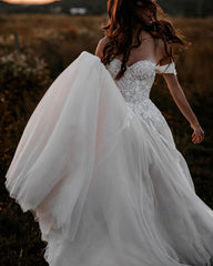 A-Line Off-the-Shoulder Tulle Wedding Dress with Lace Appliques