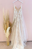 Stunning A-Line Tulle Wedding Dress with Spaghetti Straps and Lace Appliques