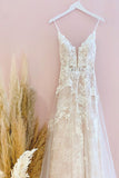 Stunning A-Line Tulle Wedding Dress with Spaghetti Straps and Lace Appliques