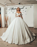 Sweetheart Pearl Floor-Length Ruffle Ball Gown Wedding Dress with Long Sleeves