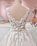 Vintage A-Line Deep V-Neck Backless Ruffle Wedding Dress with Tulle and Lace Appliques