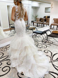 Trumpet/Mermaid V-neck Tulle Sweep Train Wedding Dress with Tiered Skirt