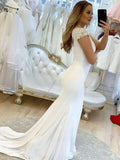 V-neck Stretch Crepe Trumpet/Mermaid Wedding Dresses With Appliques Lace and Sweep Train